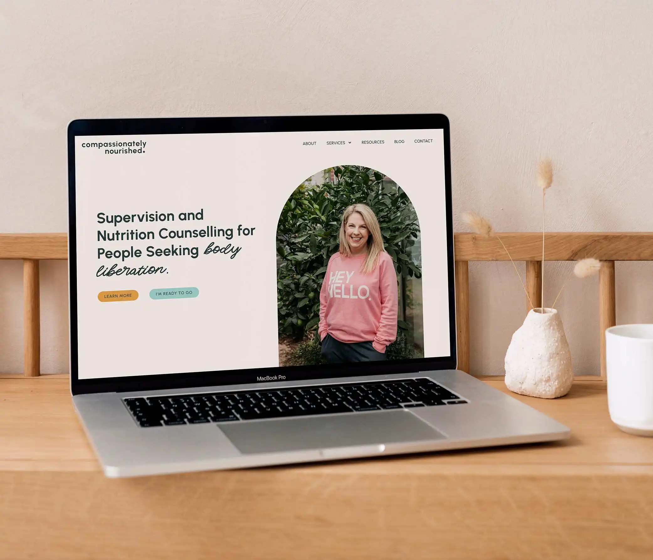 A mockup of the Compassionately Nourished SEO, copywriting and website design project.